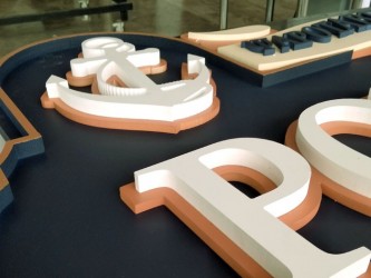Wooden sign with 3D letters